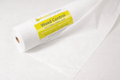 Roll of 'Grasshopper' weed control fabric on a white background